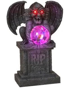 Sitzender Gargoyle Auf Grabstein Mit Licht